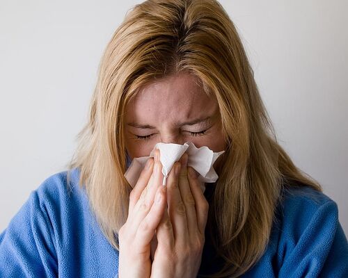 woman-blow-blowing-nose